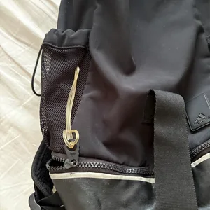 Adidas Black Backpack with Pink Strap | Karrot Adidas Black Backpack with Pink Strap | Karrot