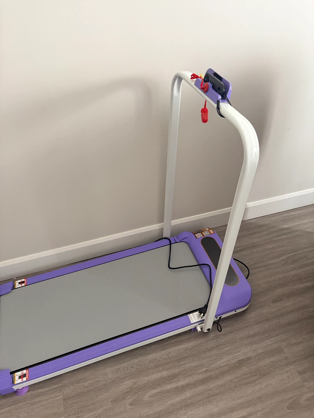 Purple walking pad with handle