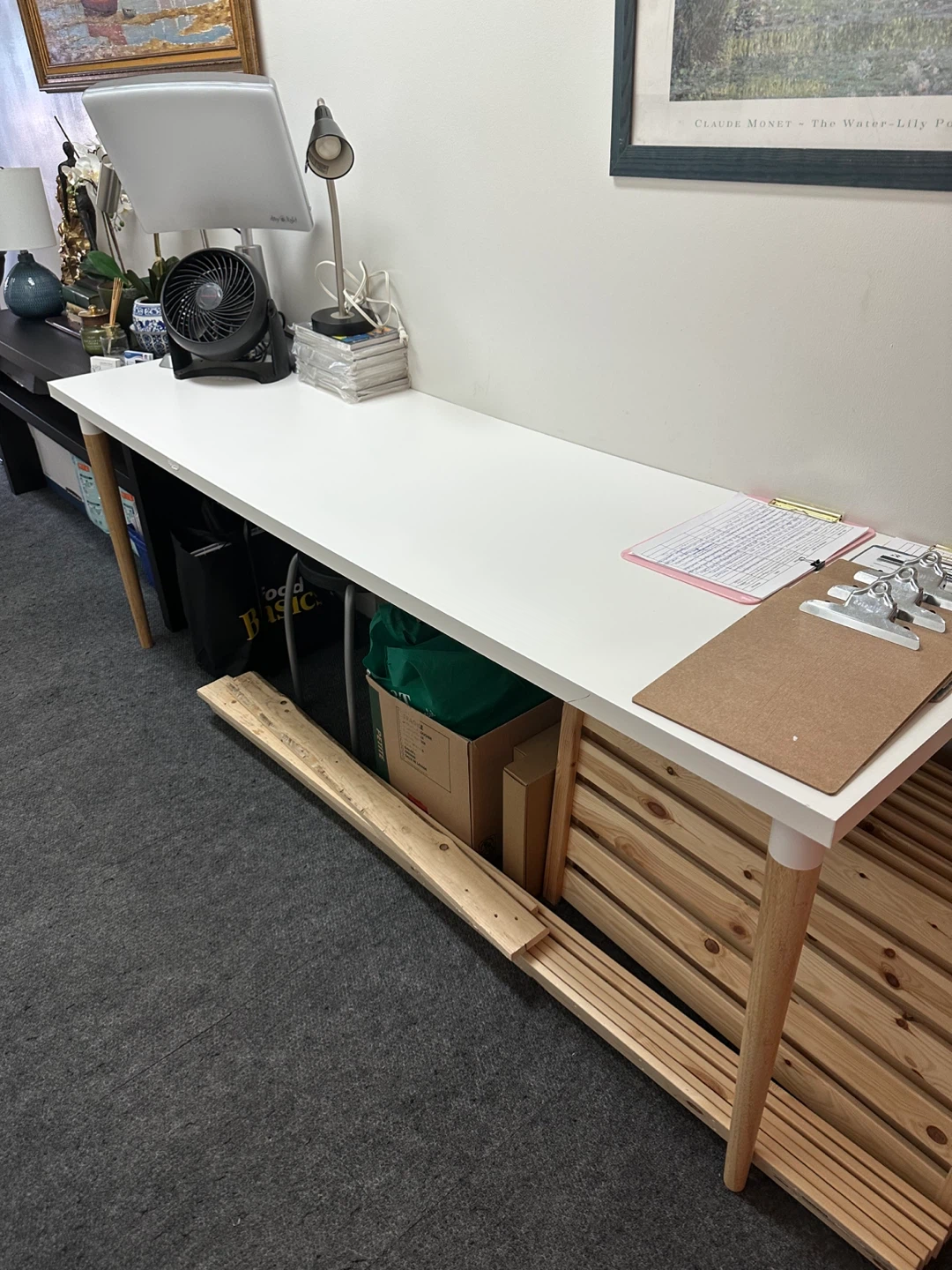 White narrow desk with wooden legs