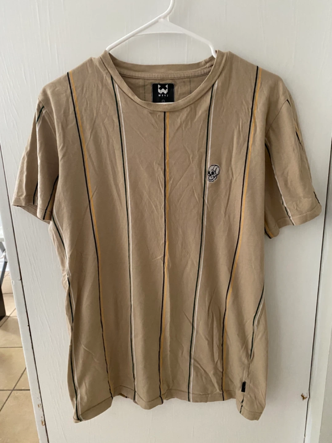 Men’s medium shirts take both for 5.00