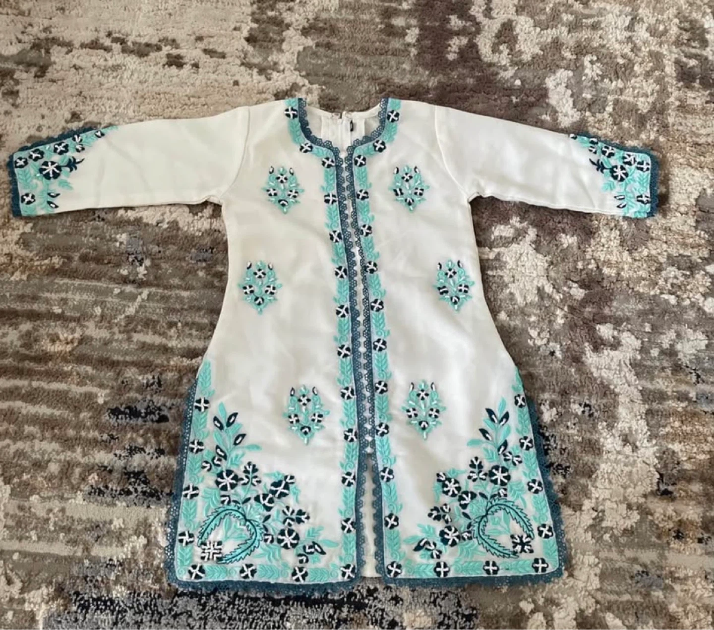 White embroidered tunics girl