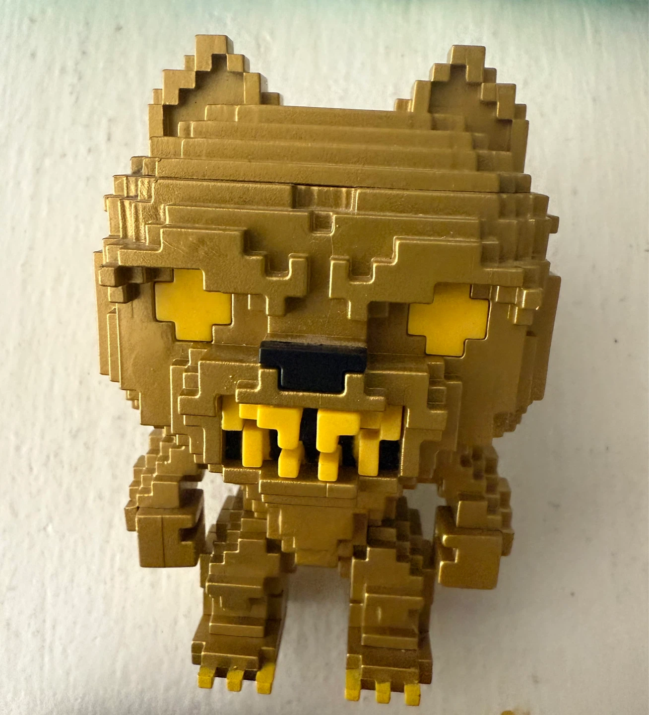 Gold Pixelated Monster Figurine