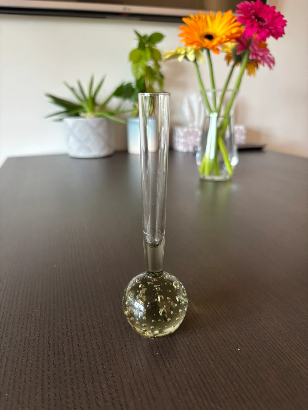 Glass bud vase with decorative base