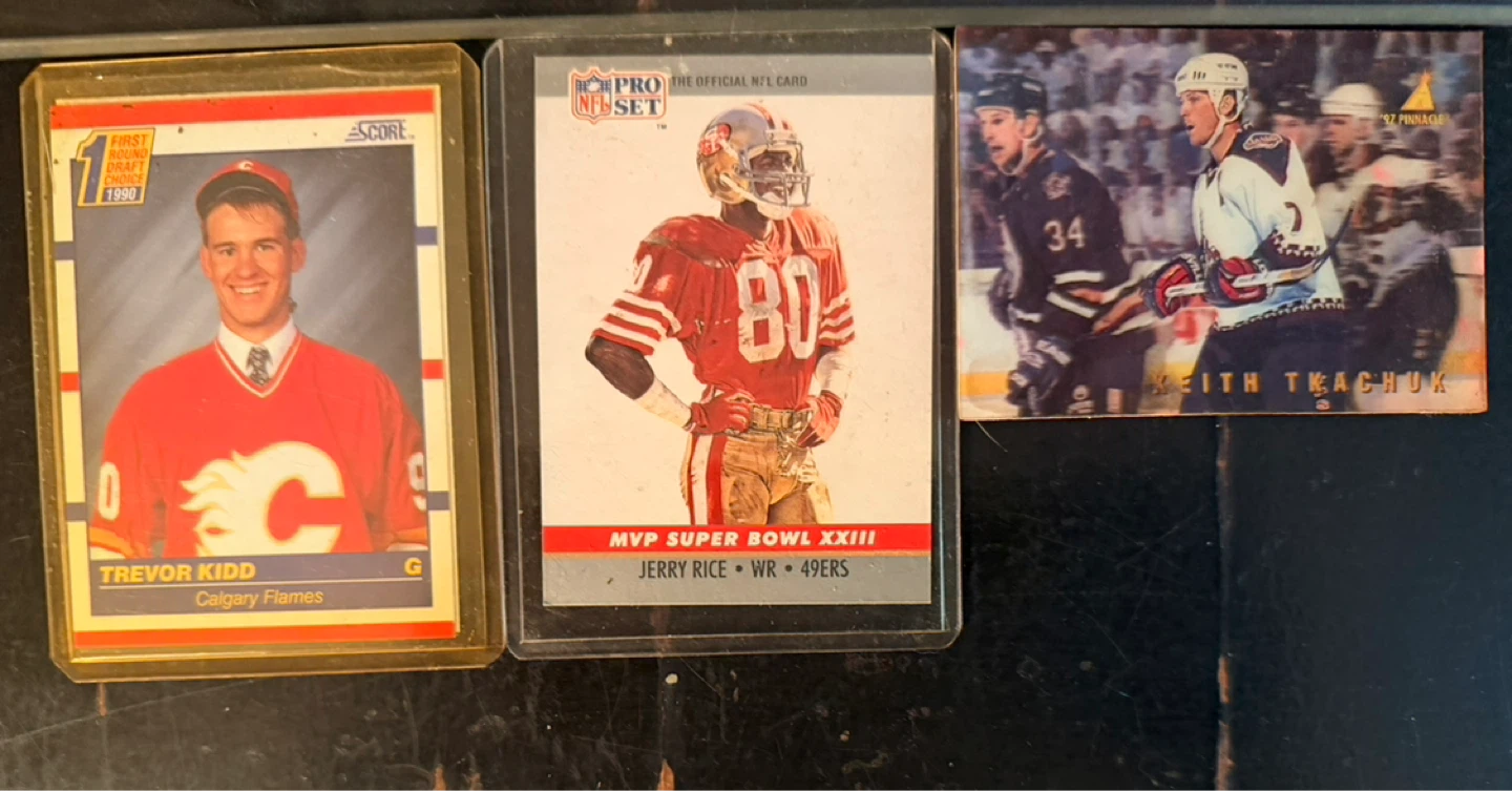 Lot of three sports trading cards