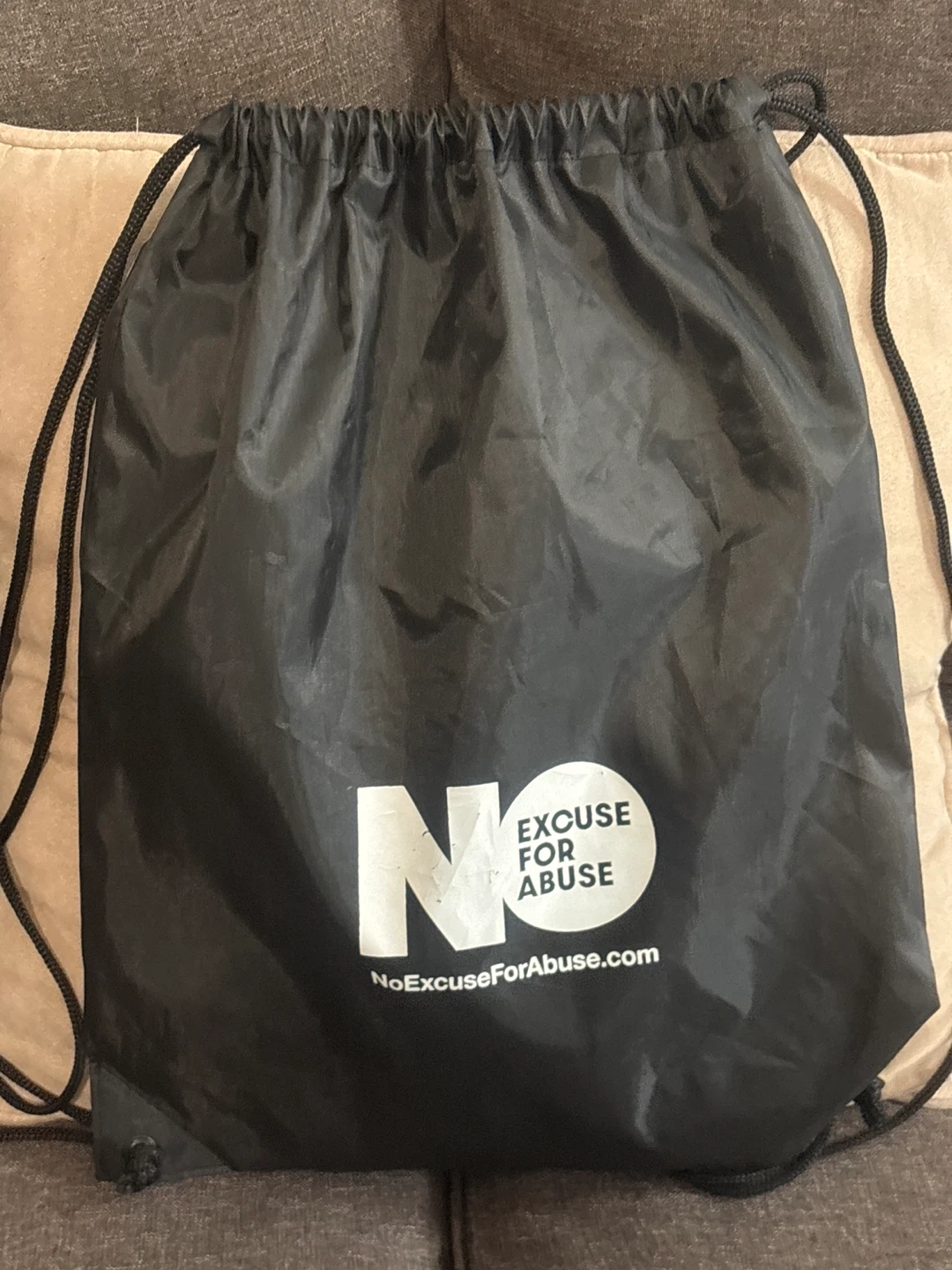Black Drawstring Bag with "No Excuse Logo