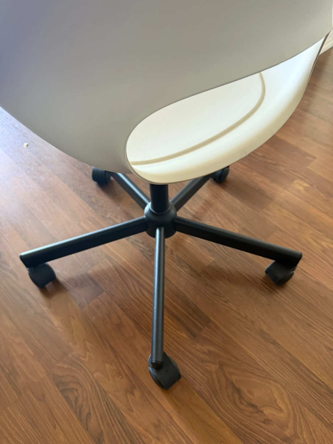 White task chair with rolling base