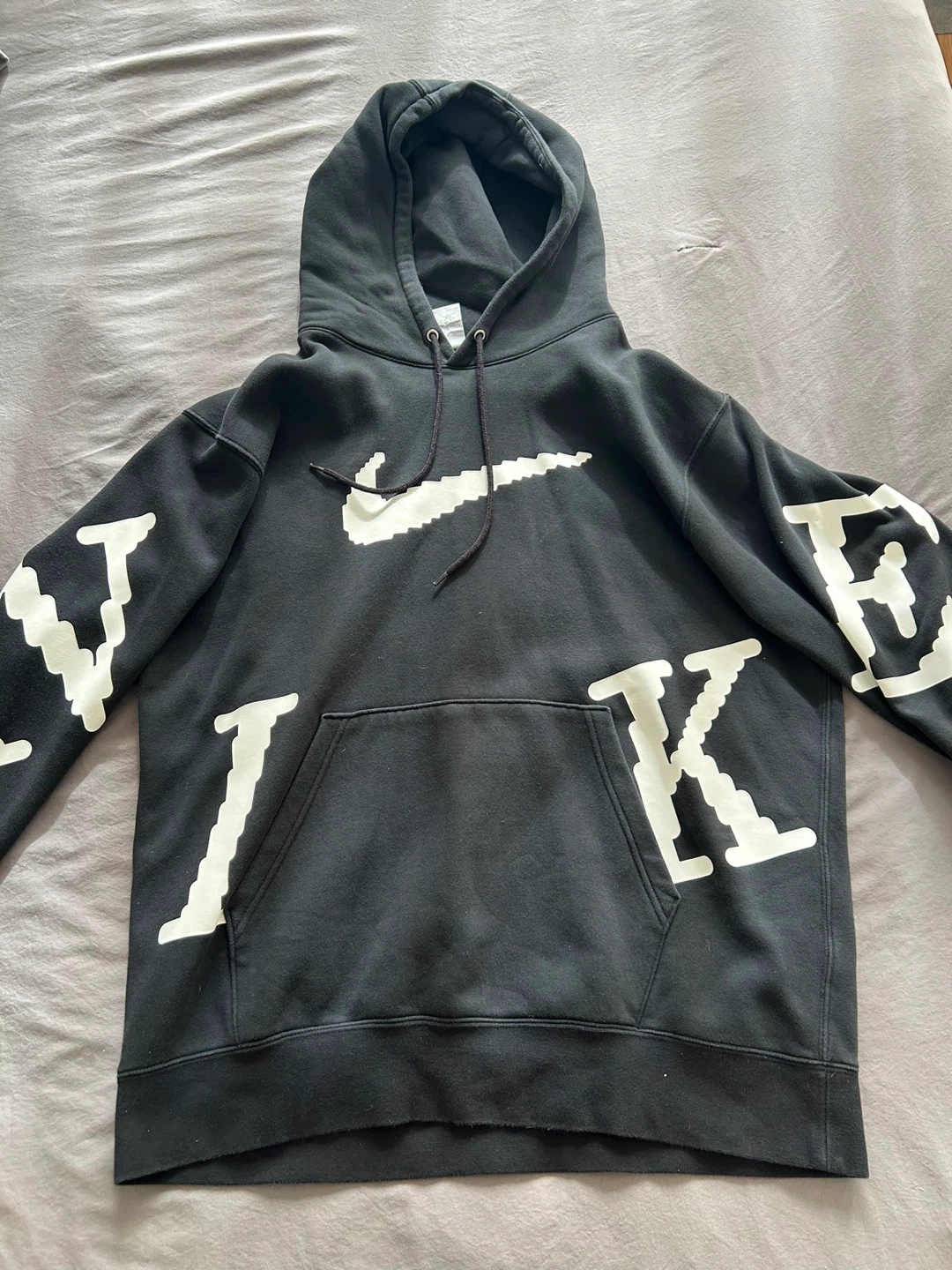 Nike Black Hoodie with Pixelated Swoosh