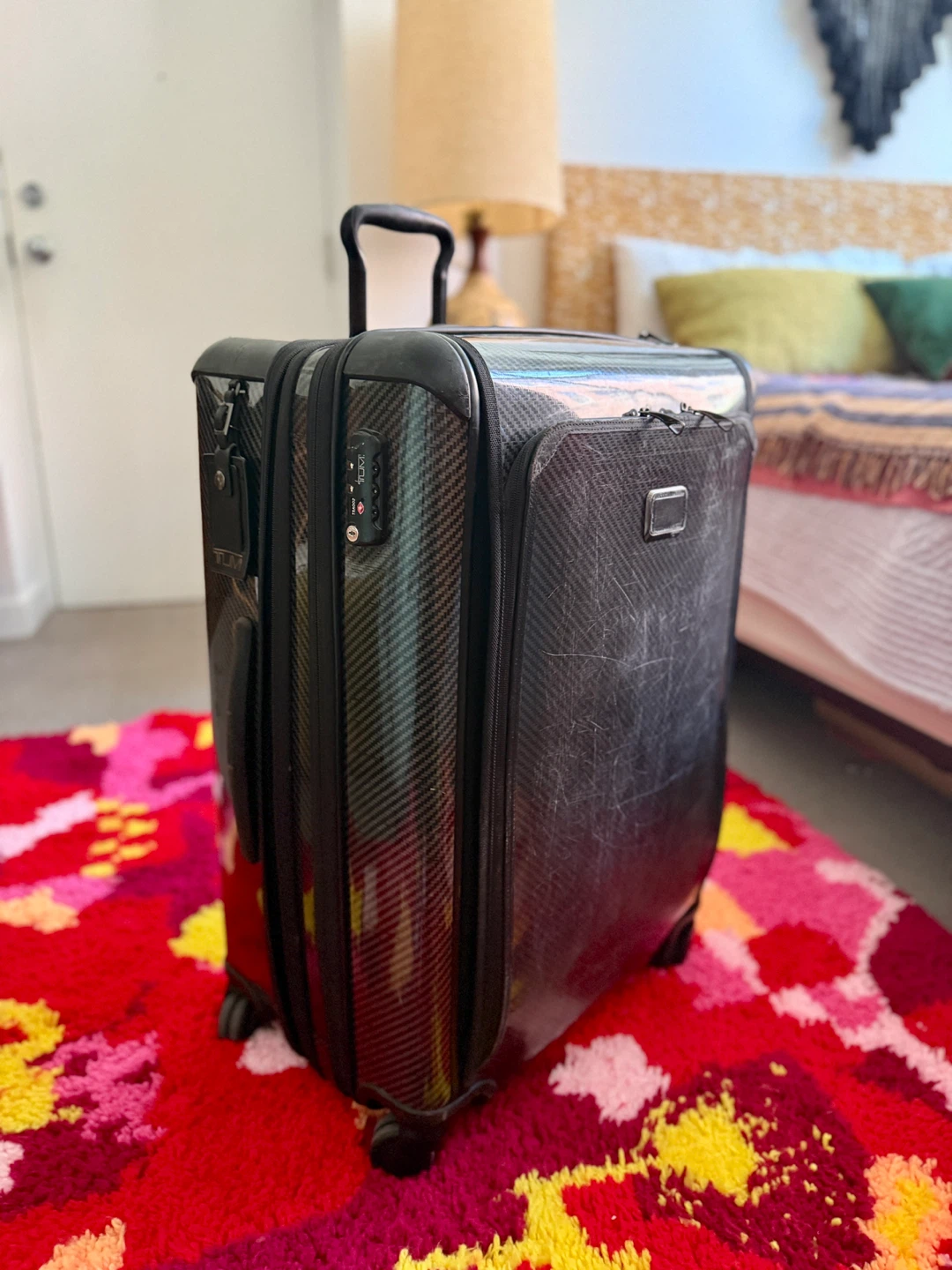 TUMI Tegris Spinner Checked Luggage