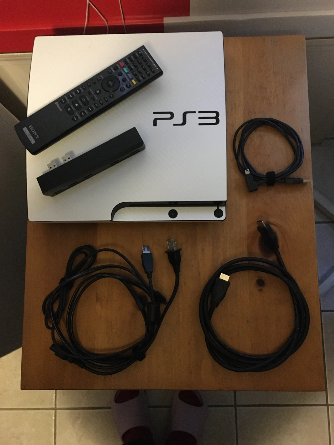 Sony PlayStation 3 (PS3) with controllers and accessories