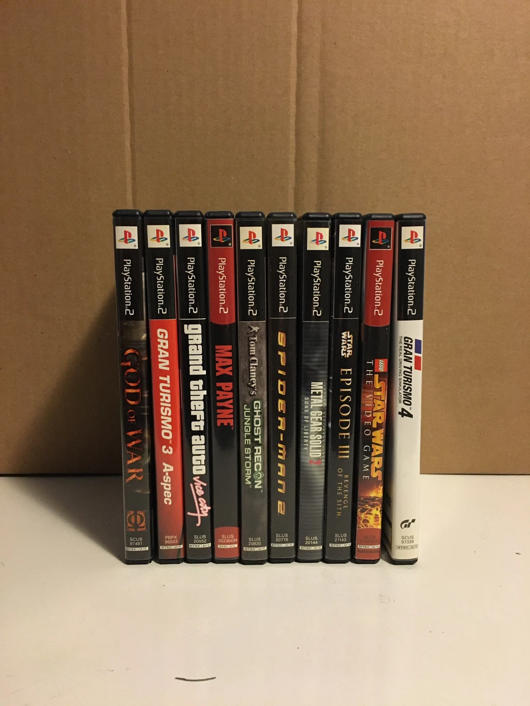 Sony PlayStation 2 Console Bundle with Games and Controllers - photo 2