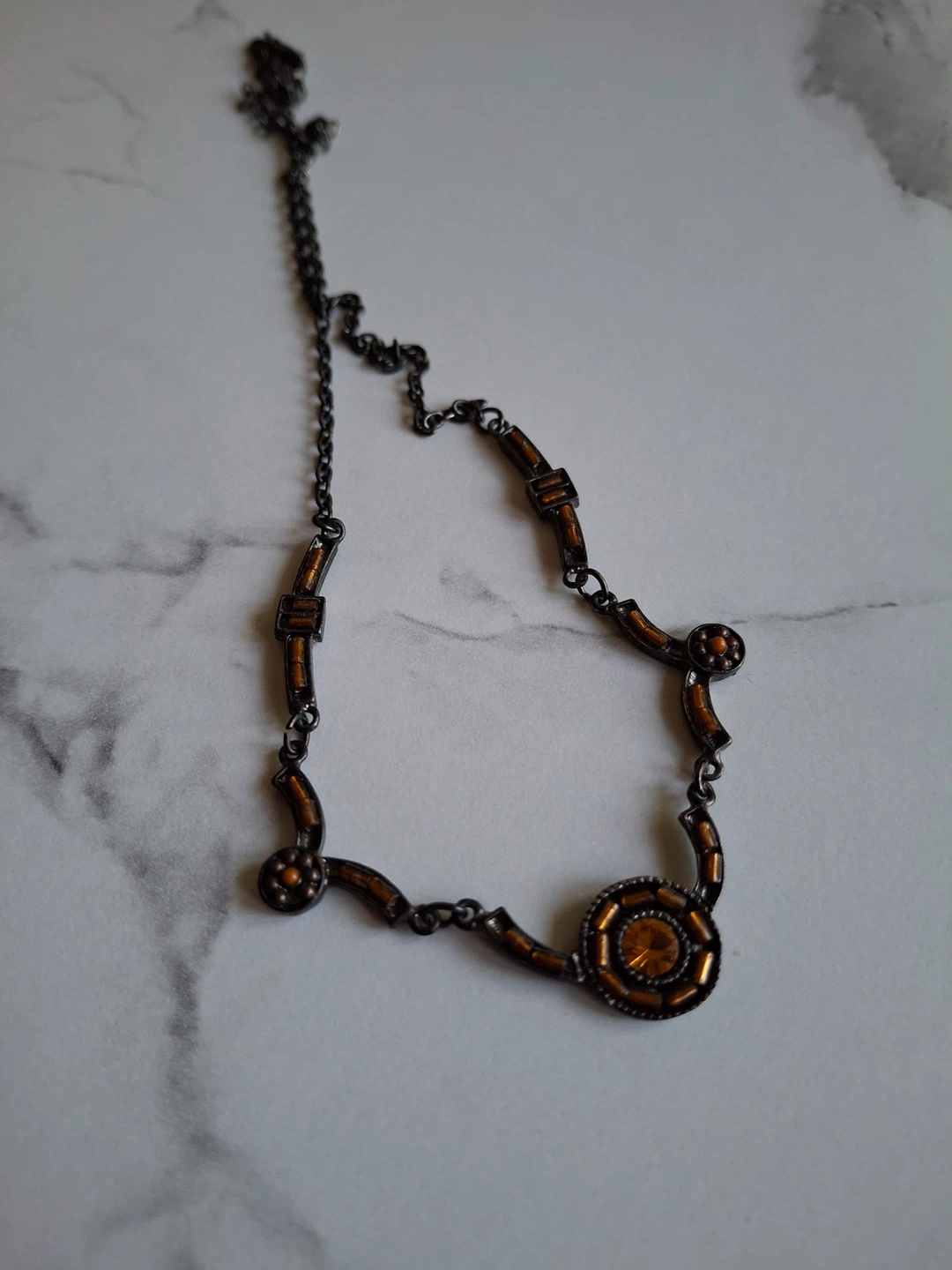 Necklace with amber coloured stone & beads