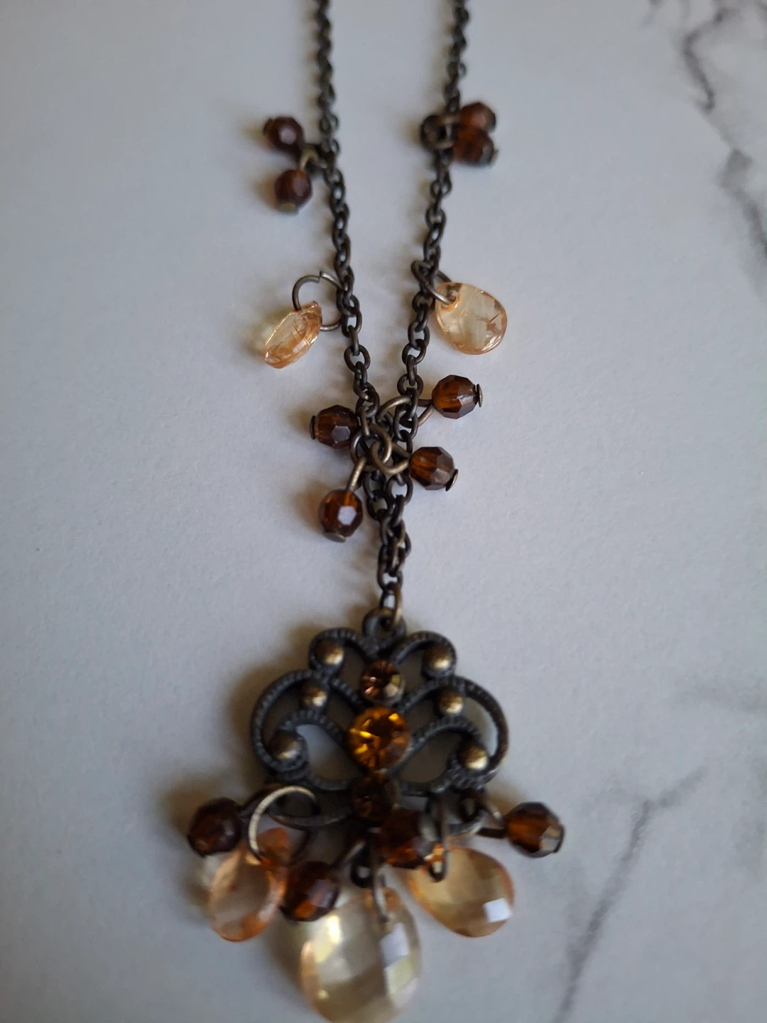 Necklace with brown & amber coloured bead detail