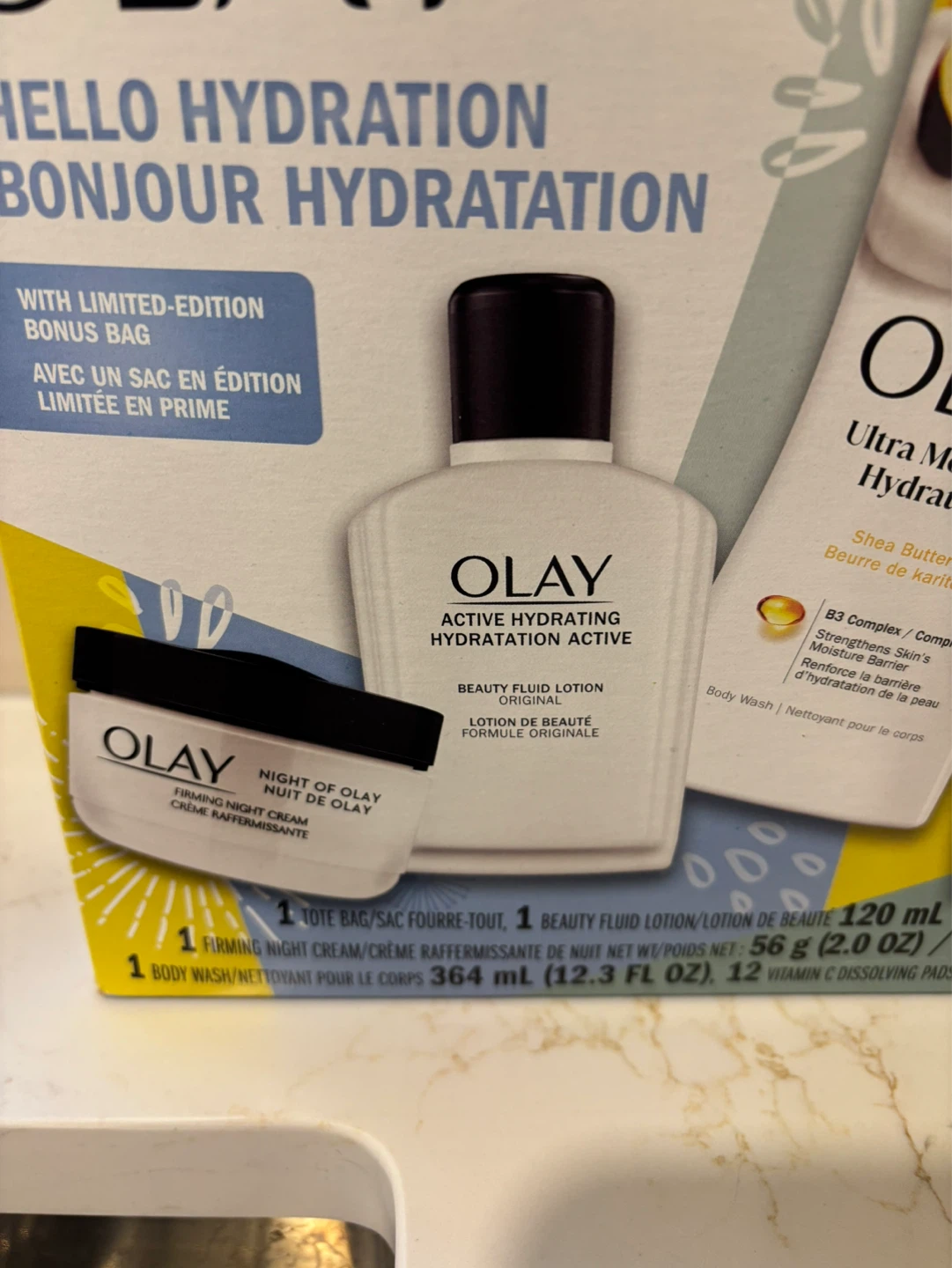 Olay Hello Hydration 4-Piece Skin Care Set with Bag - photo 2