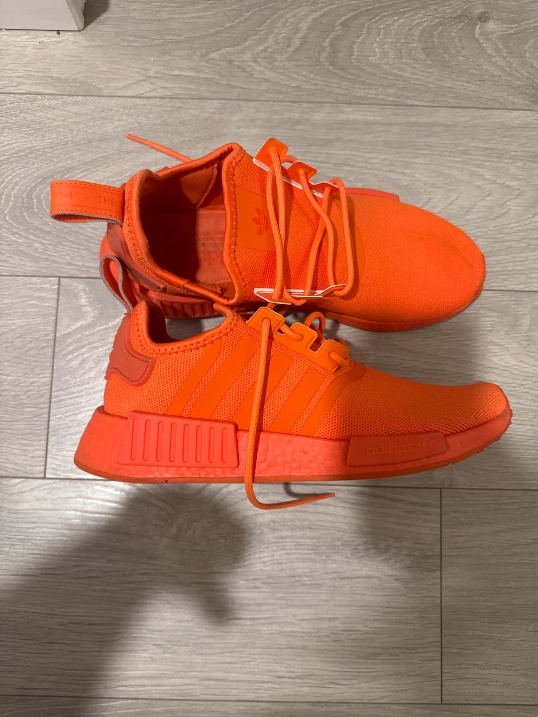 Orange Adidas NMD Shoes