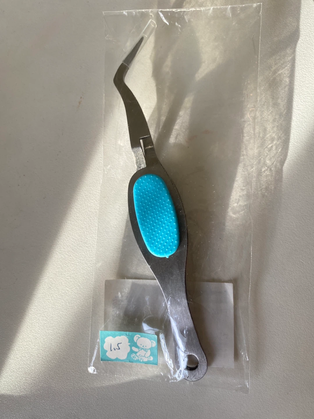 Curved Tip Tweezer with Blue Grip