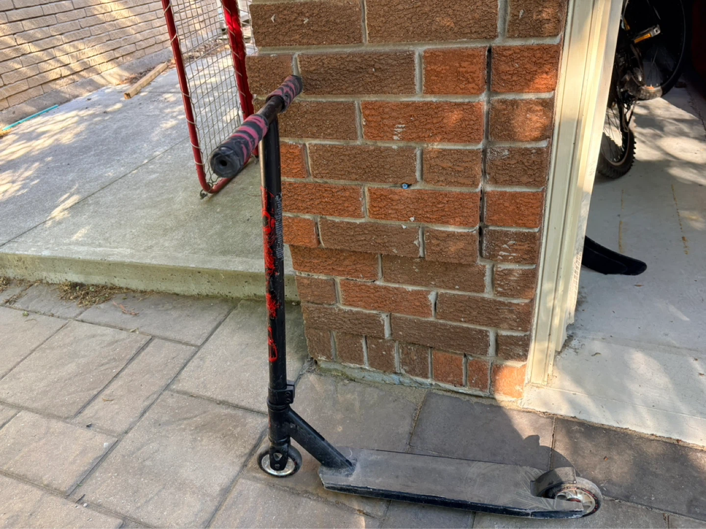 Jibs Black Scooter with Red and Black Grips