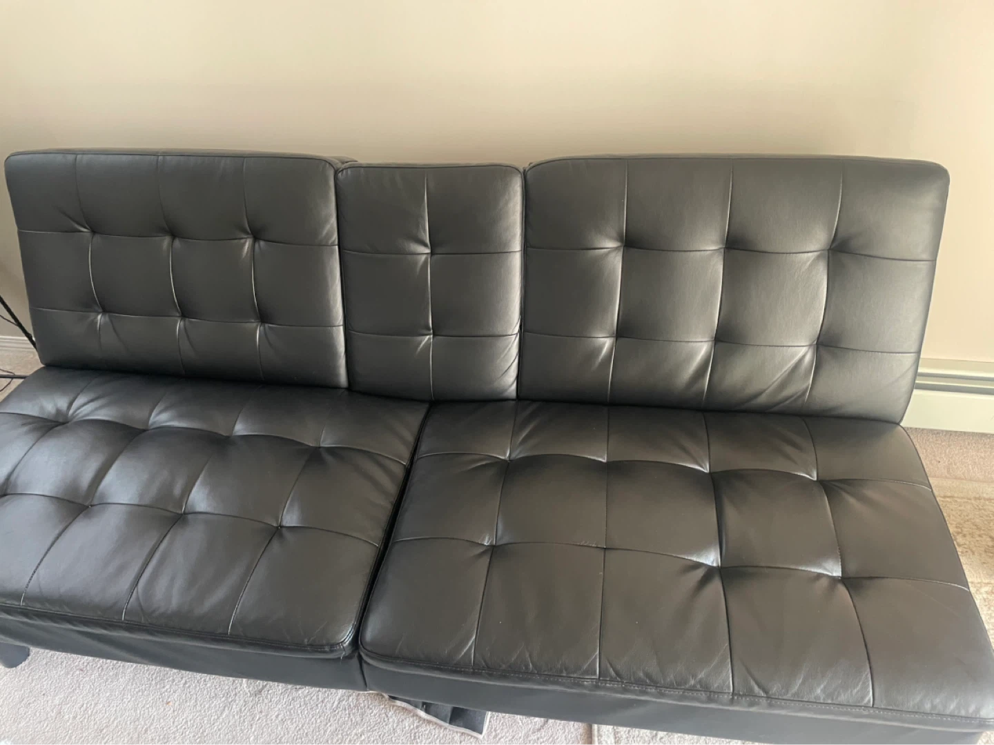 Black Faux Leather Tufted Futon Sofa