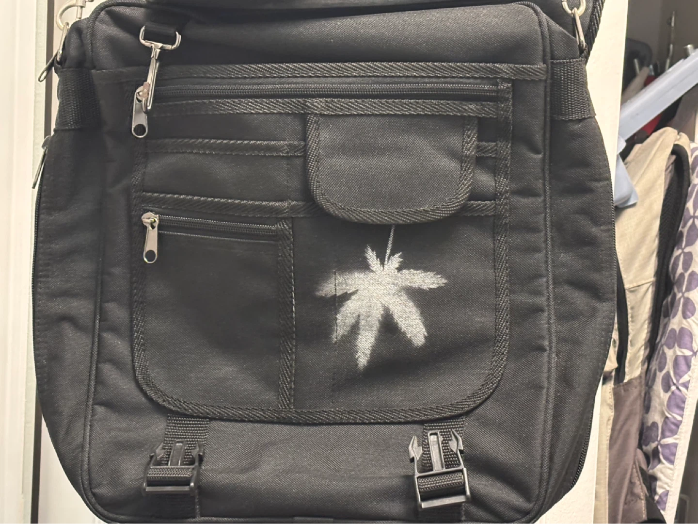 Black Messenger Bag with Skull and Leaf Design