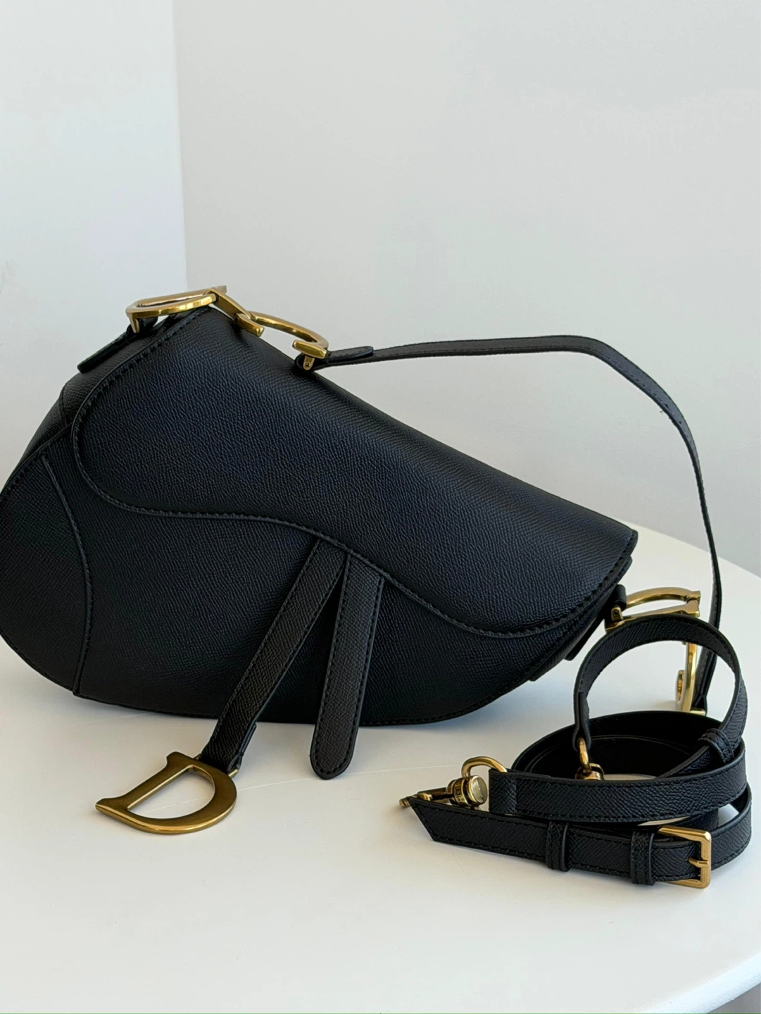 Black Leather Saddle Bag with Gold