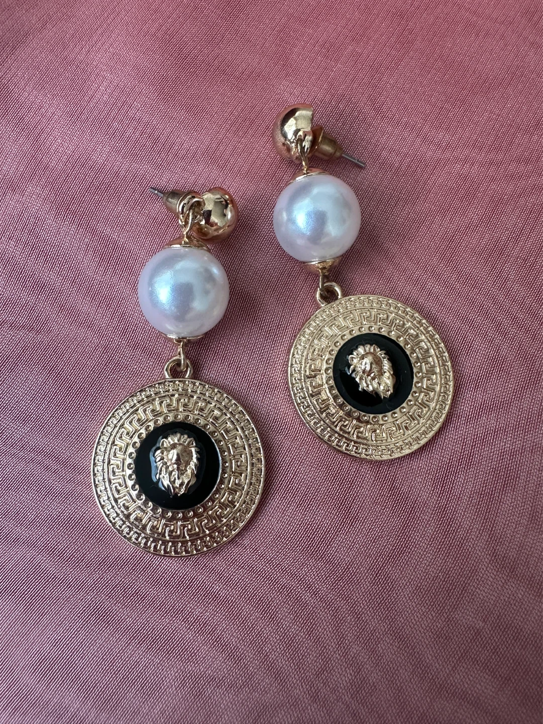 Gold tone pearl and lion head dangle earrings