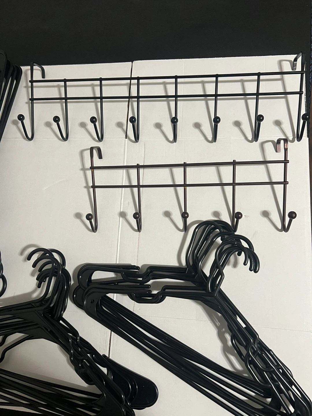 Black Plastic Hangers and Over-the-Door Hooks