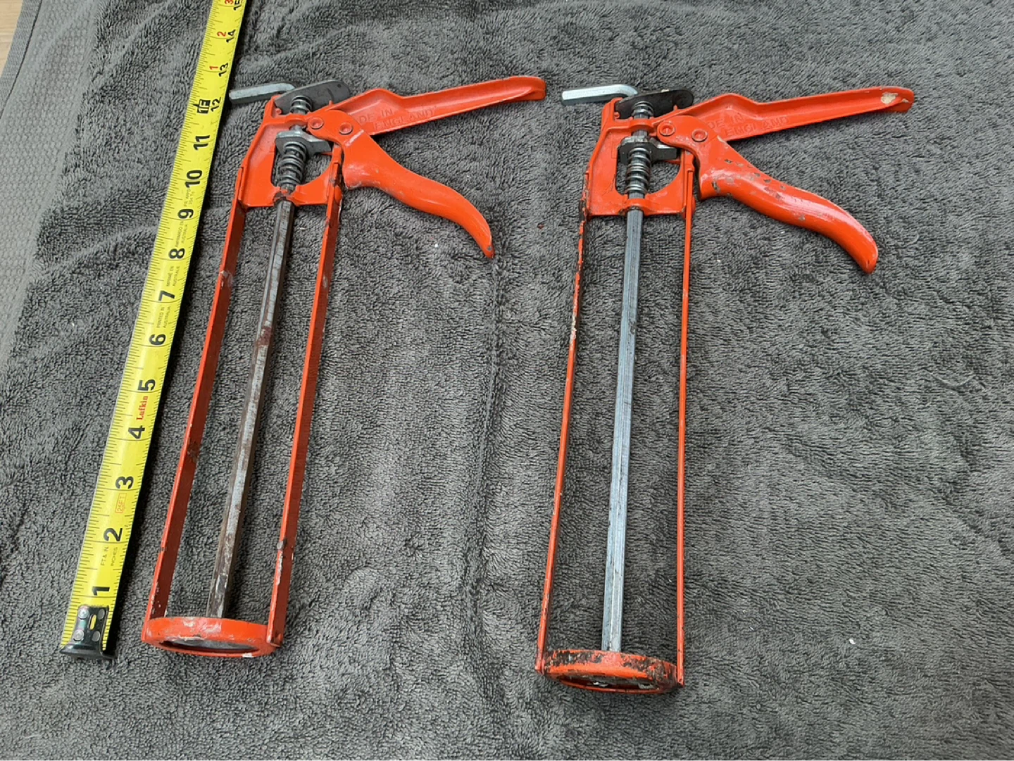 2 Vintage Orange Caulking Guns !