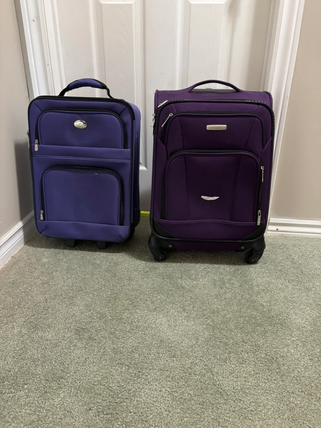 2 Purple Luggage hand carry in good condition
