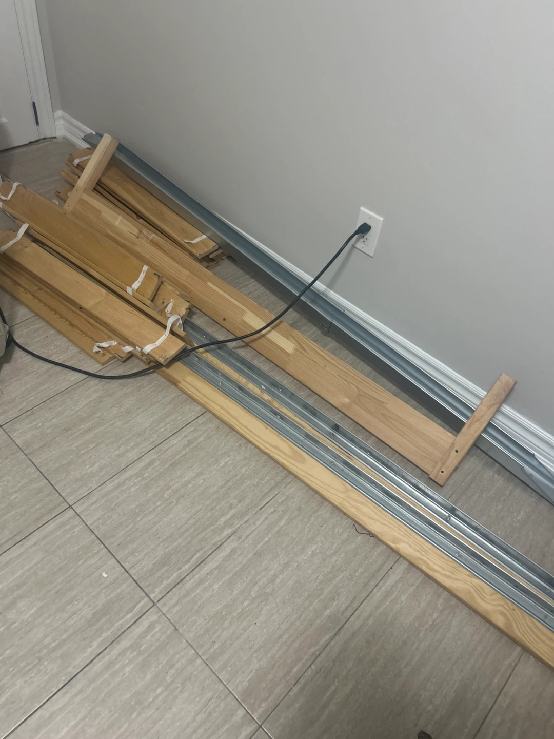 Wooden Bed Slats and Metal Frame Pieces