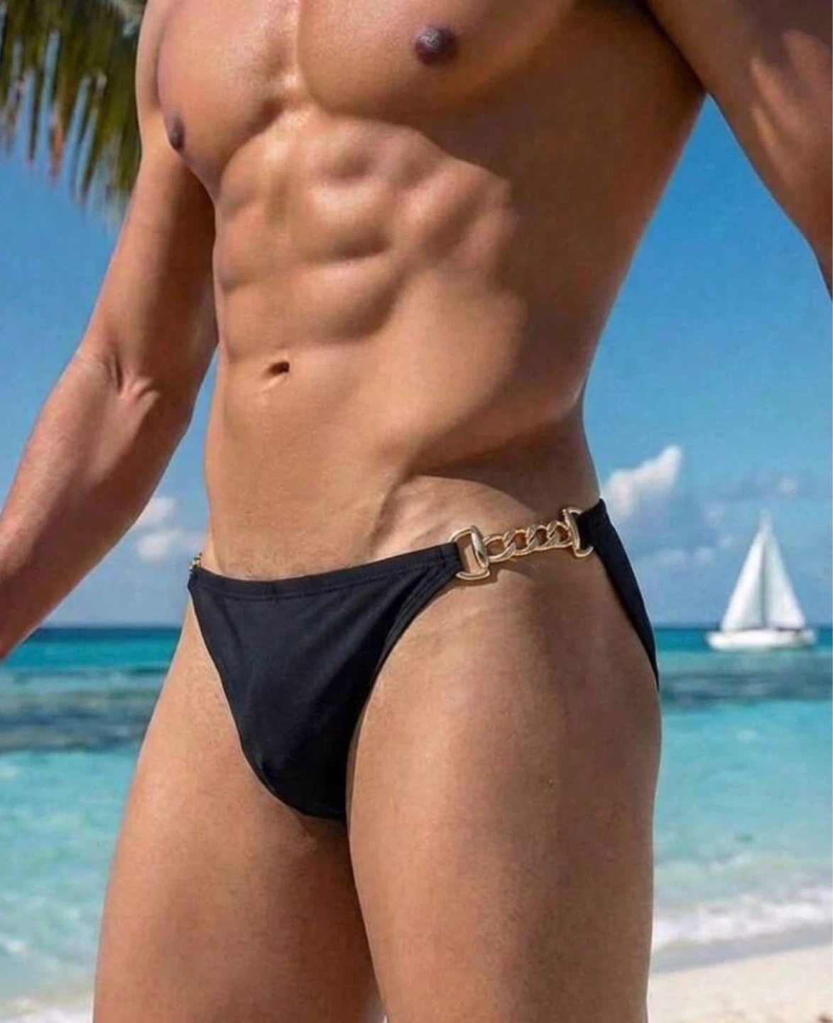 Black men's bikini brief with gold chain detail