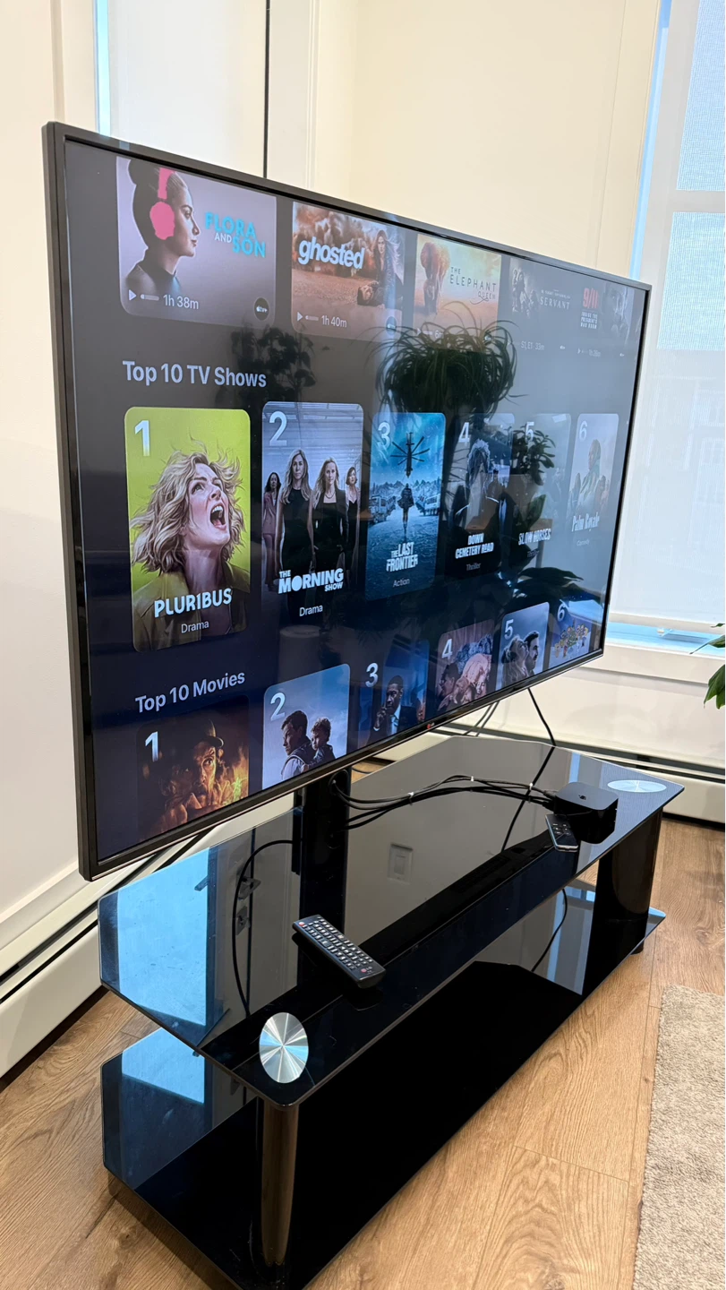 65” LG Smart TV + Modern Glass TV Stand + Apple TV Included