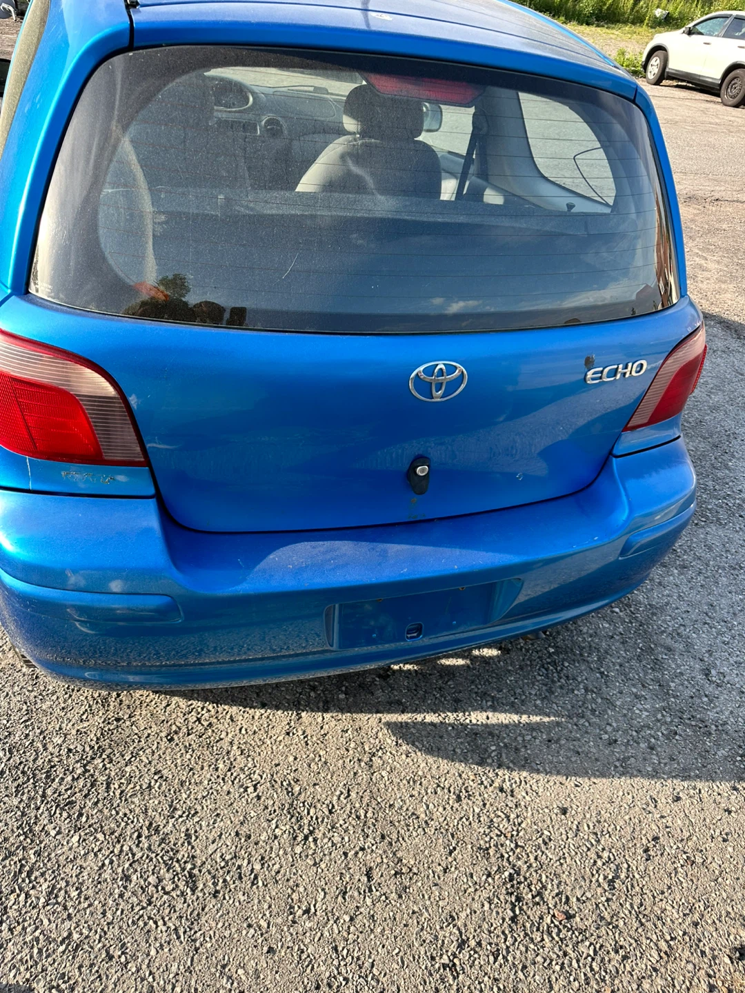 Blue Toyota Echo Hatchback - photo 5