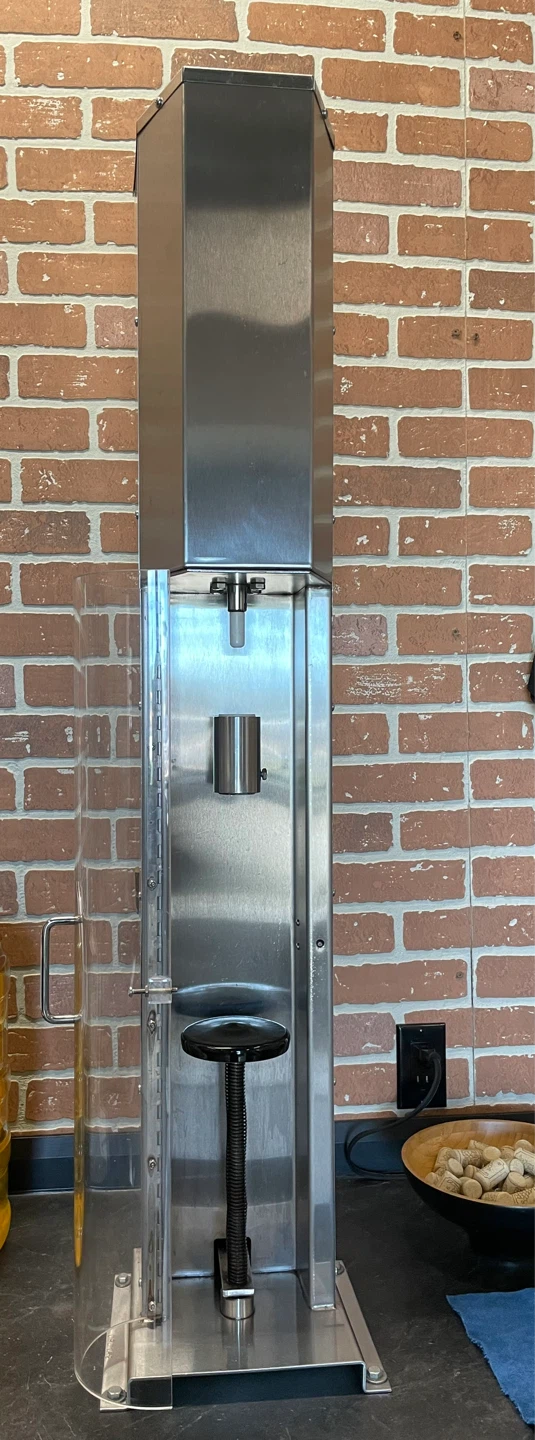 Automatic wine bottle corkers