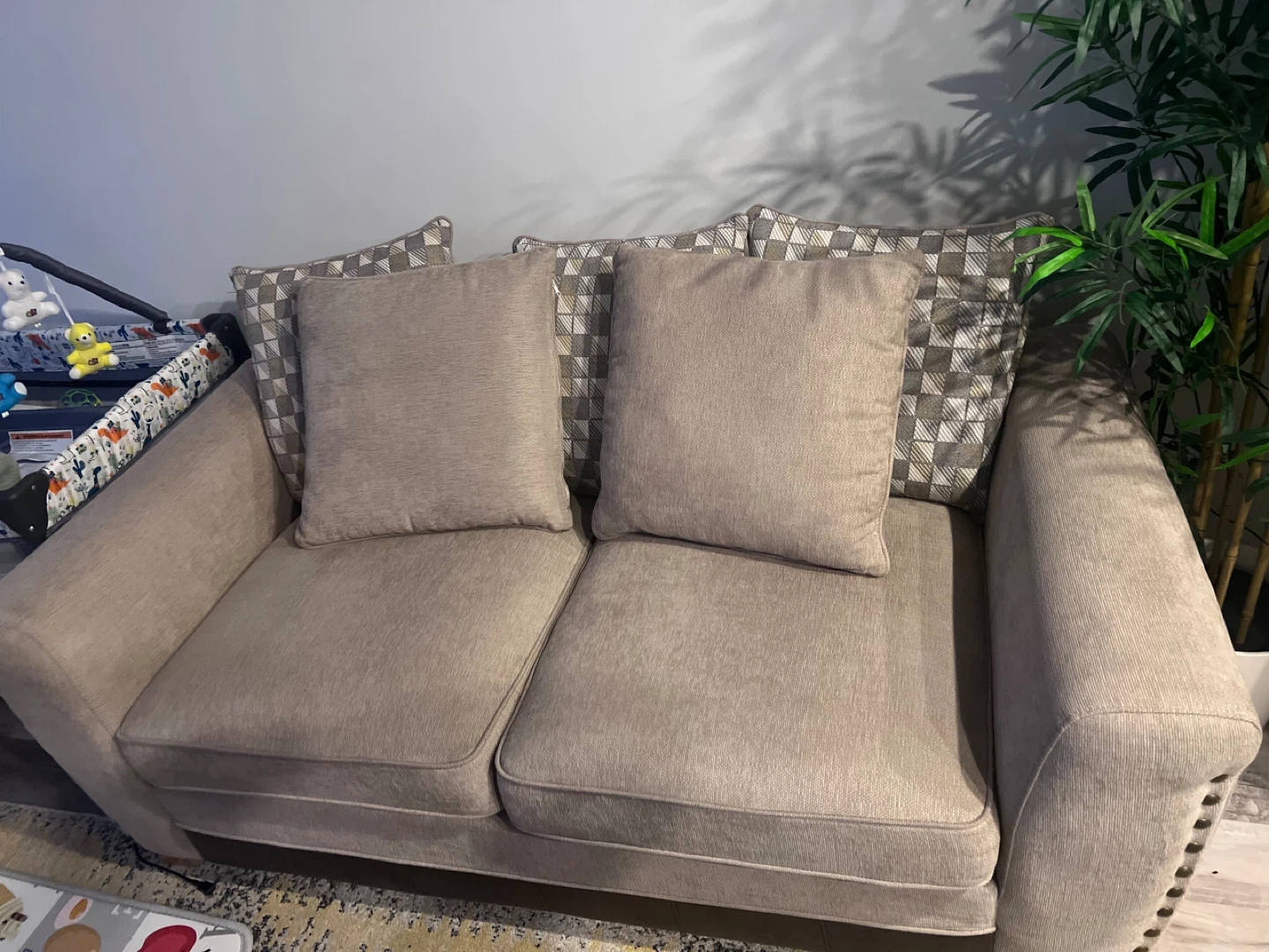 Beige Sofa with Decorative Pillows