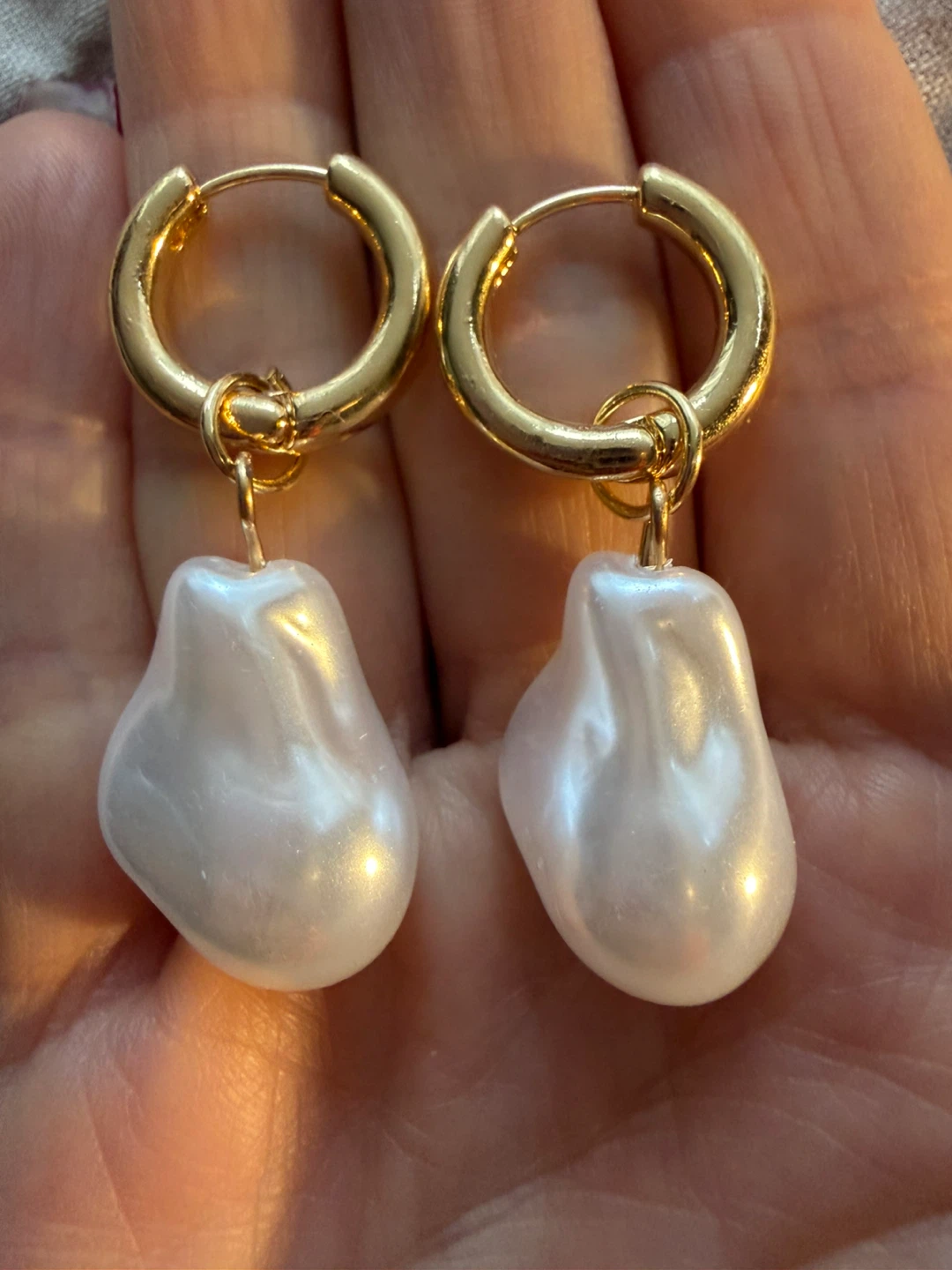 Gold pearl earrings