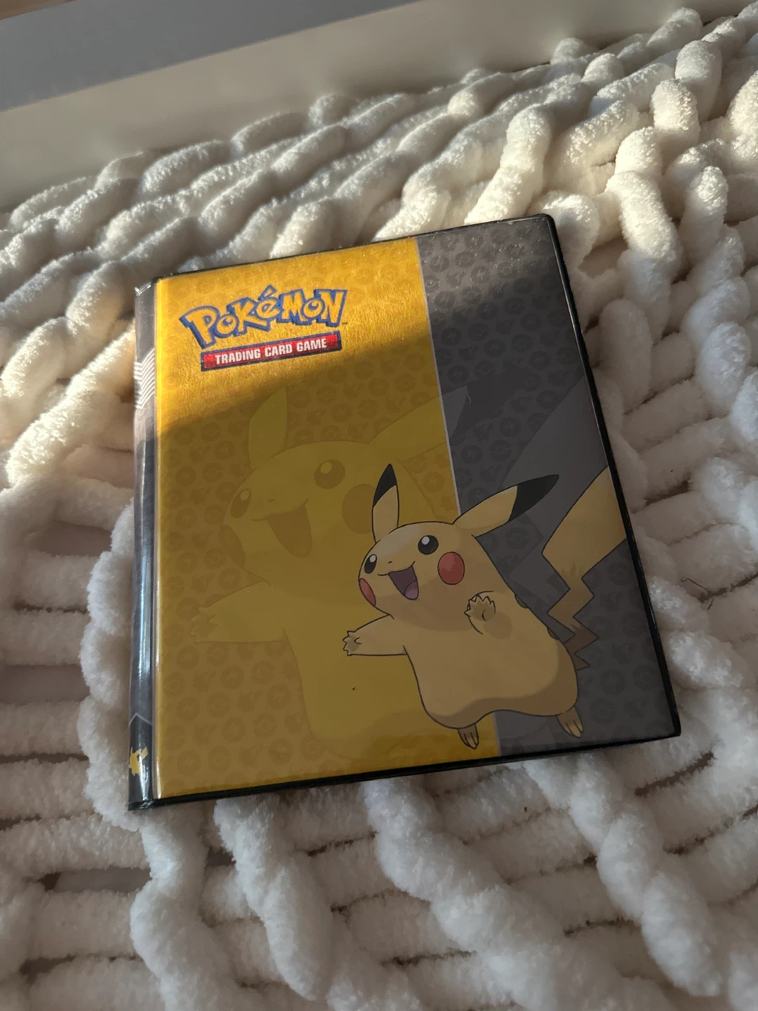 Pokémon Trading Card Binder with Assorted Cards