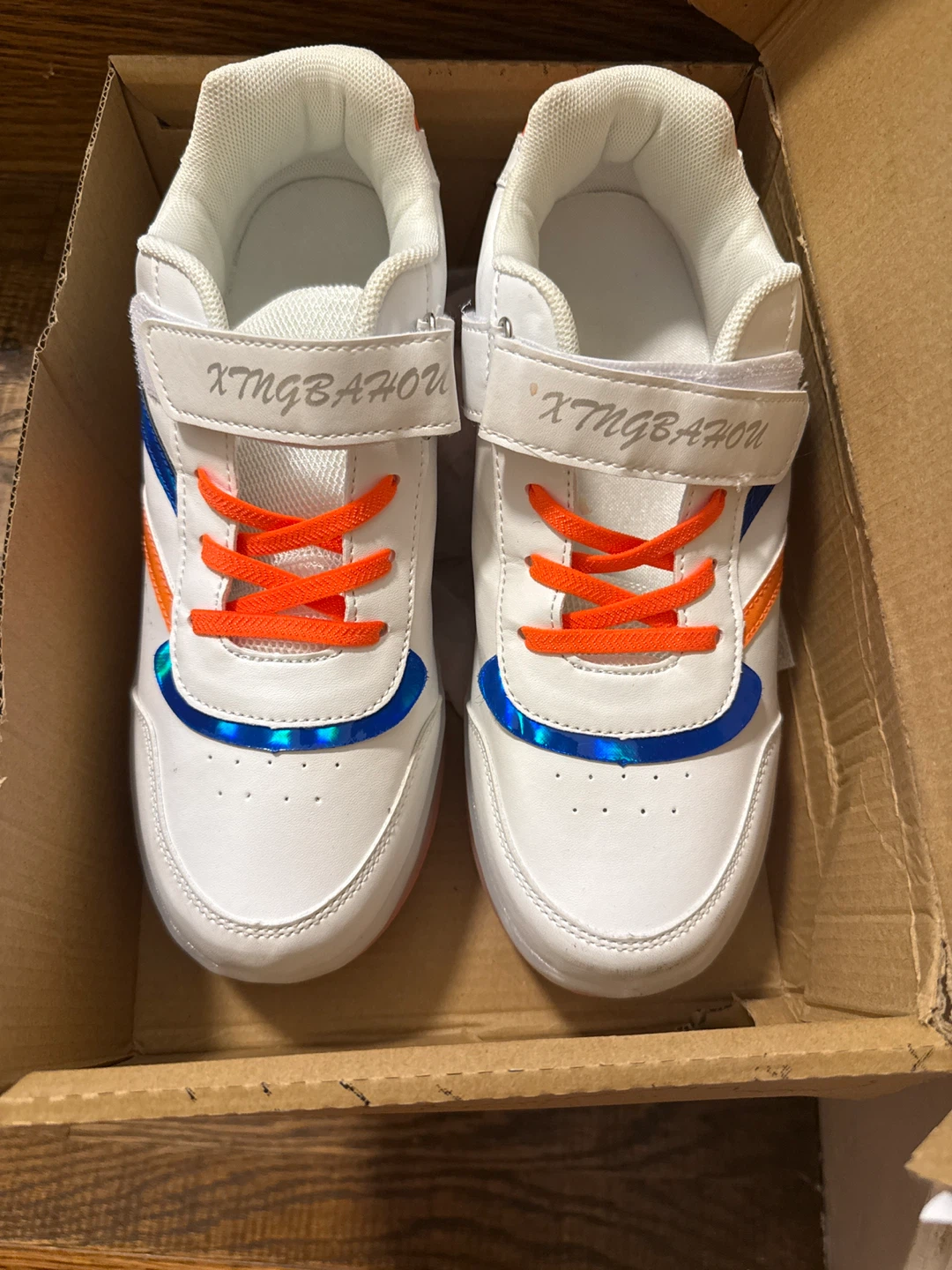 BNIB White & Orange Roller Shoes size 6