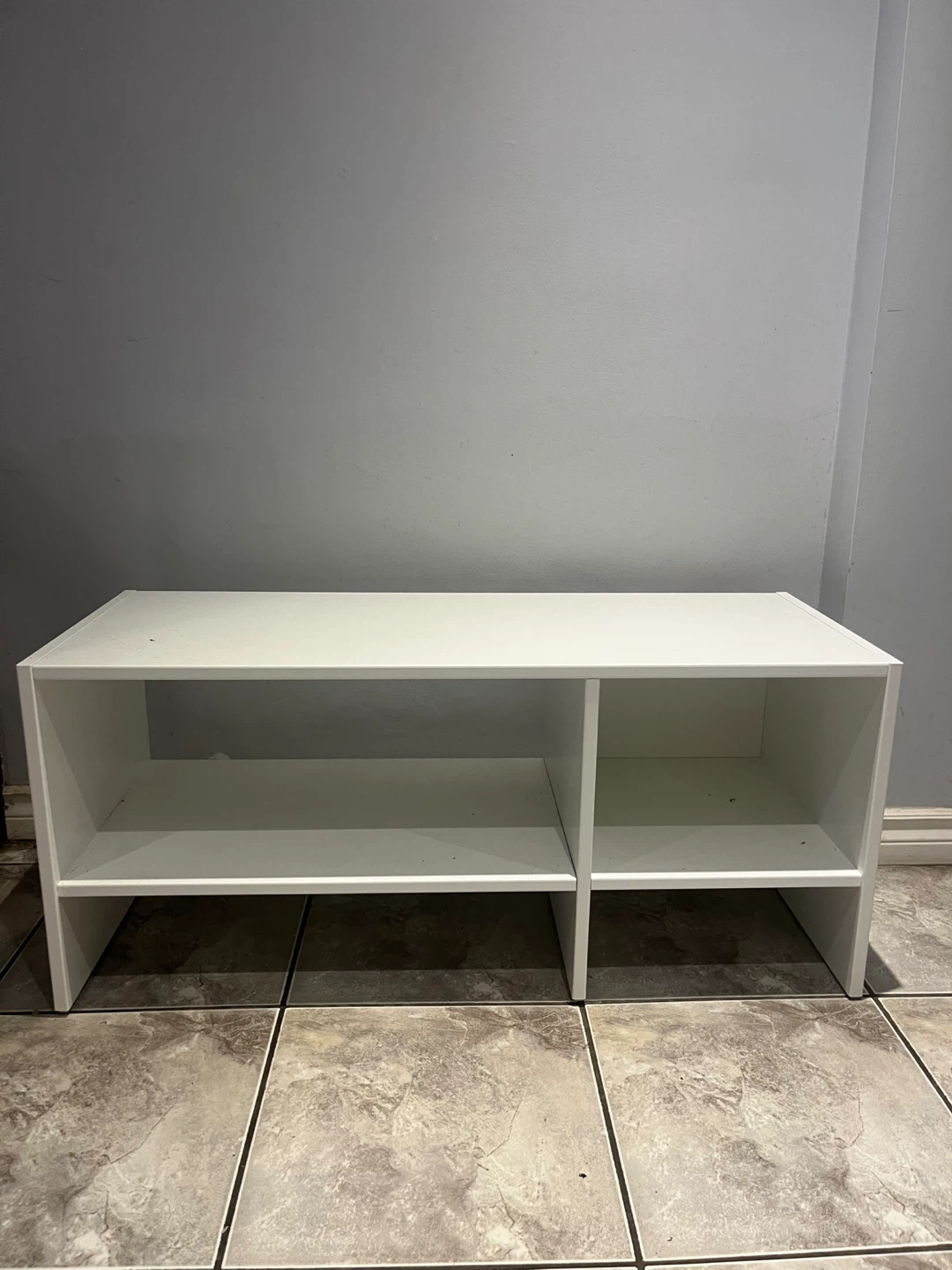 Hisense TV on white media console - photo 2