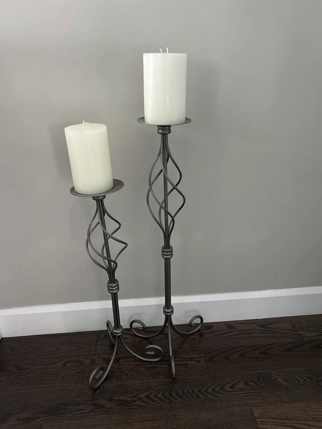 Set of 2 Gray Metal Floor Candelabras with White Pillar Candles