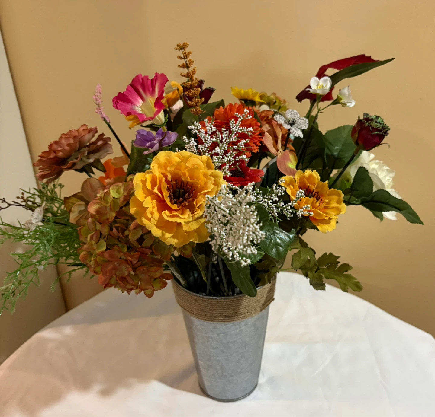 Artificial Floral Arrangement in Galvanized Vase
