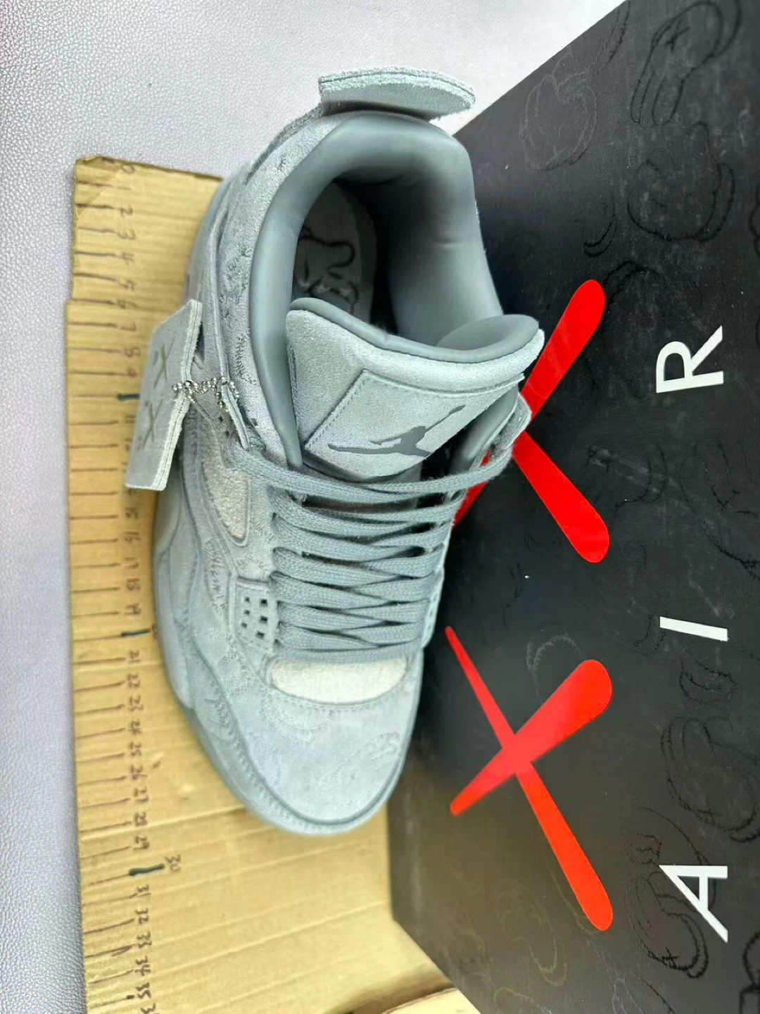 Air Jordan 4 Retro KAWS Grey - photo 2