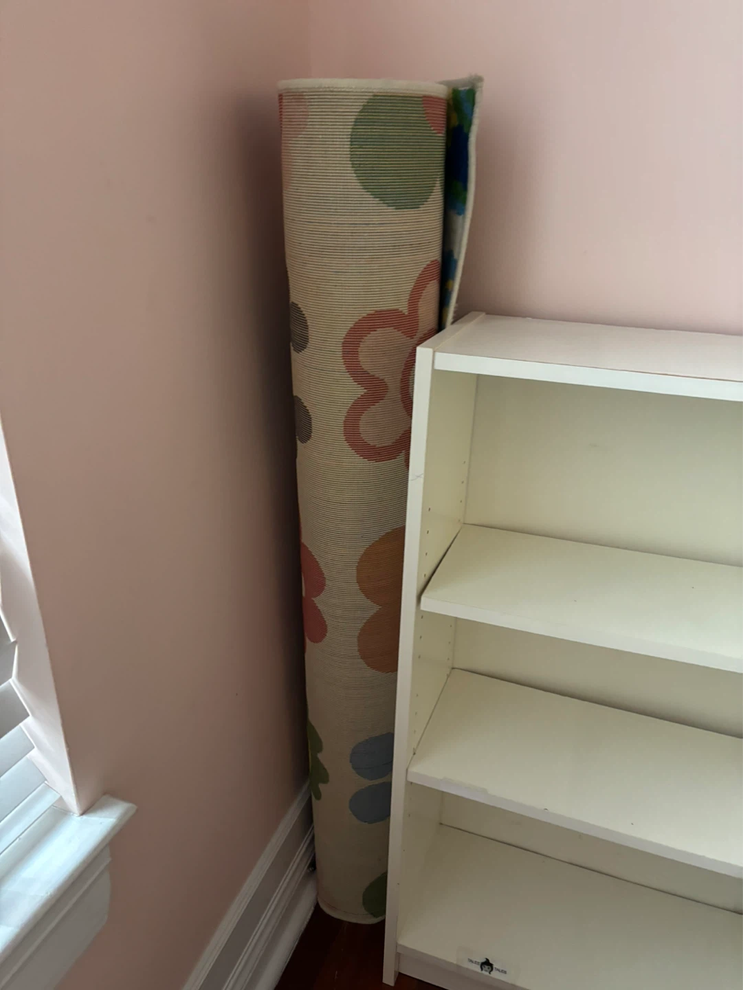 Rolled Area Rug with Flower Pattern