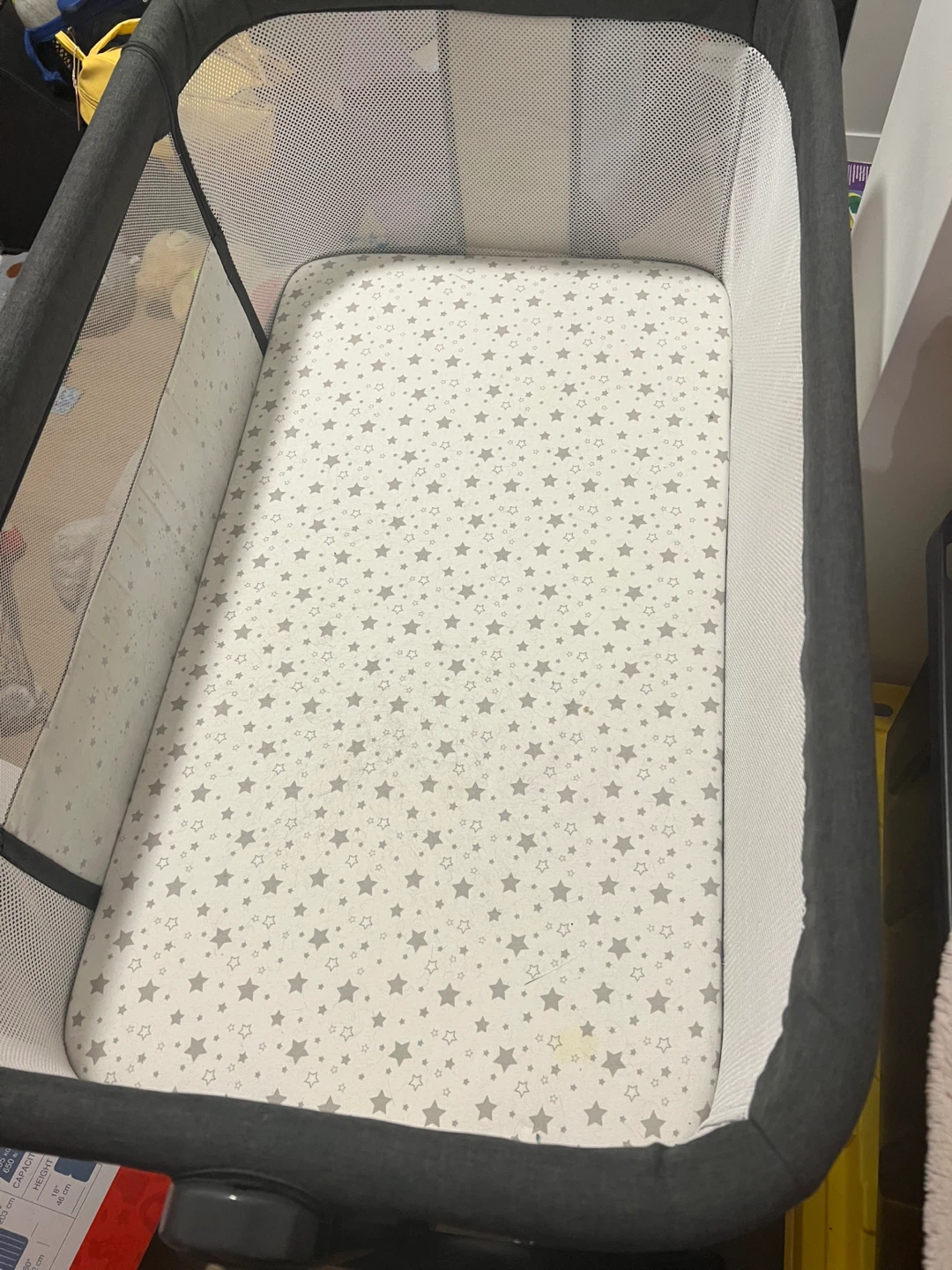 Grey Bassinet with Star Pattern Mattress