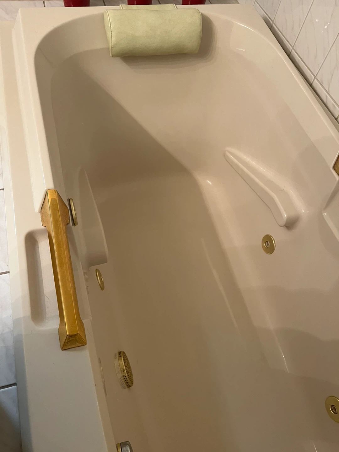 Jetted Bathtub with Pillow and Gold Accents - photo 5