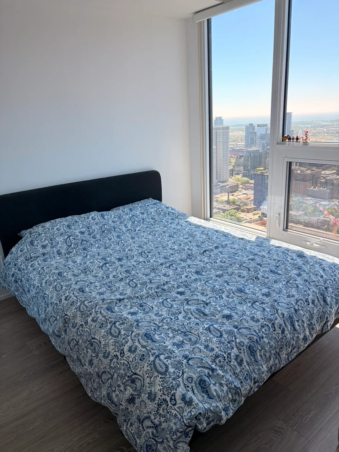 Black fabric bed frame with blue paisley duvet cover - photo 2