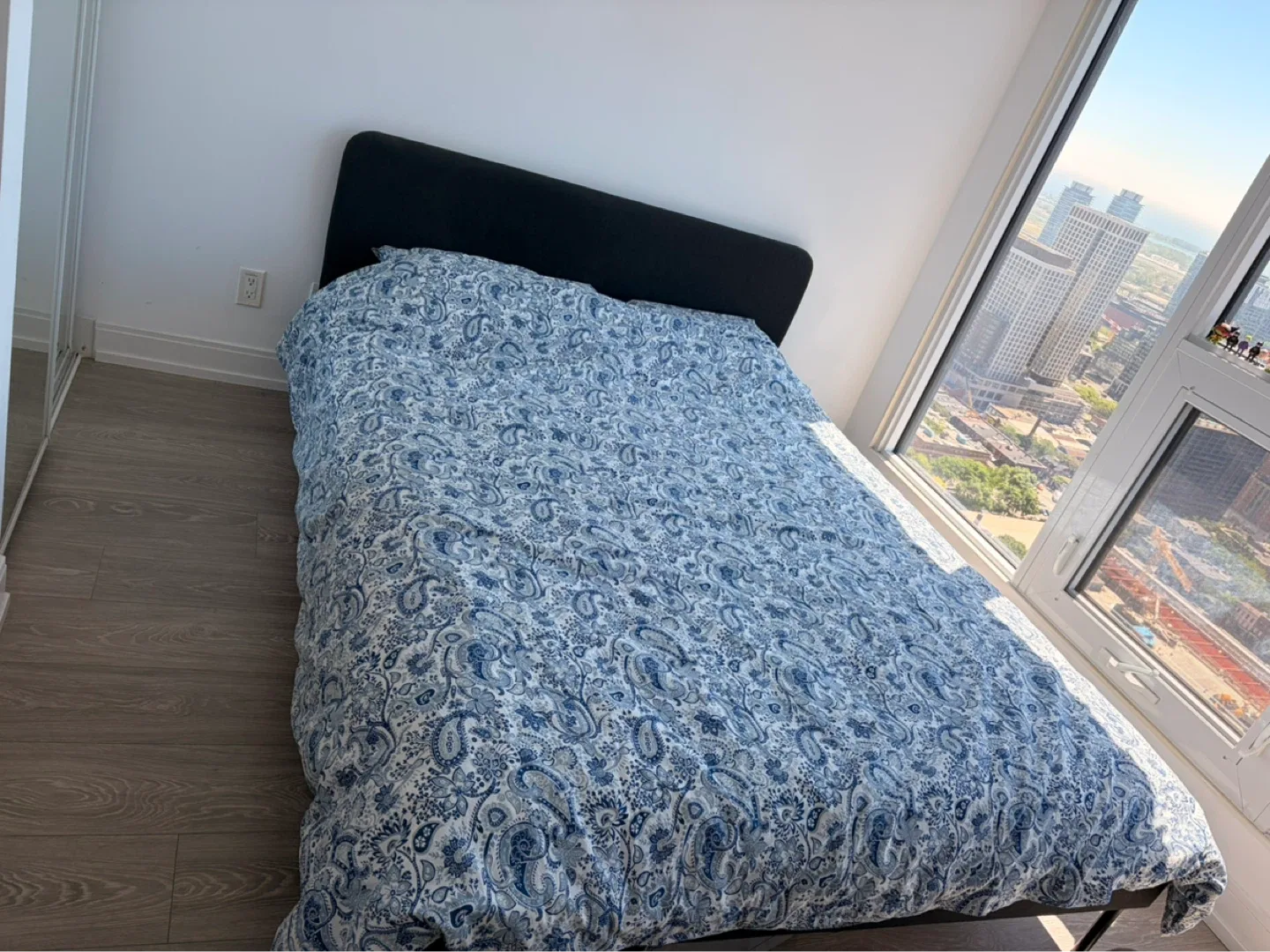 Black fabric bed frame with blue paisley duvet cover - photo 3