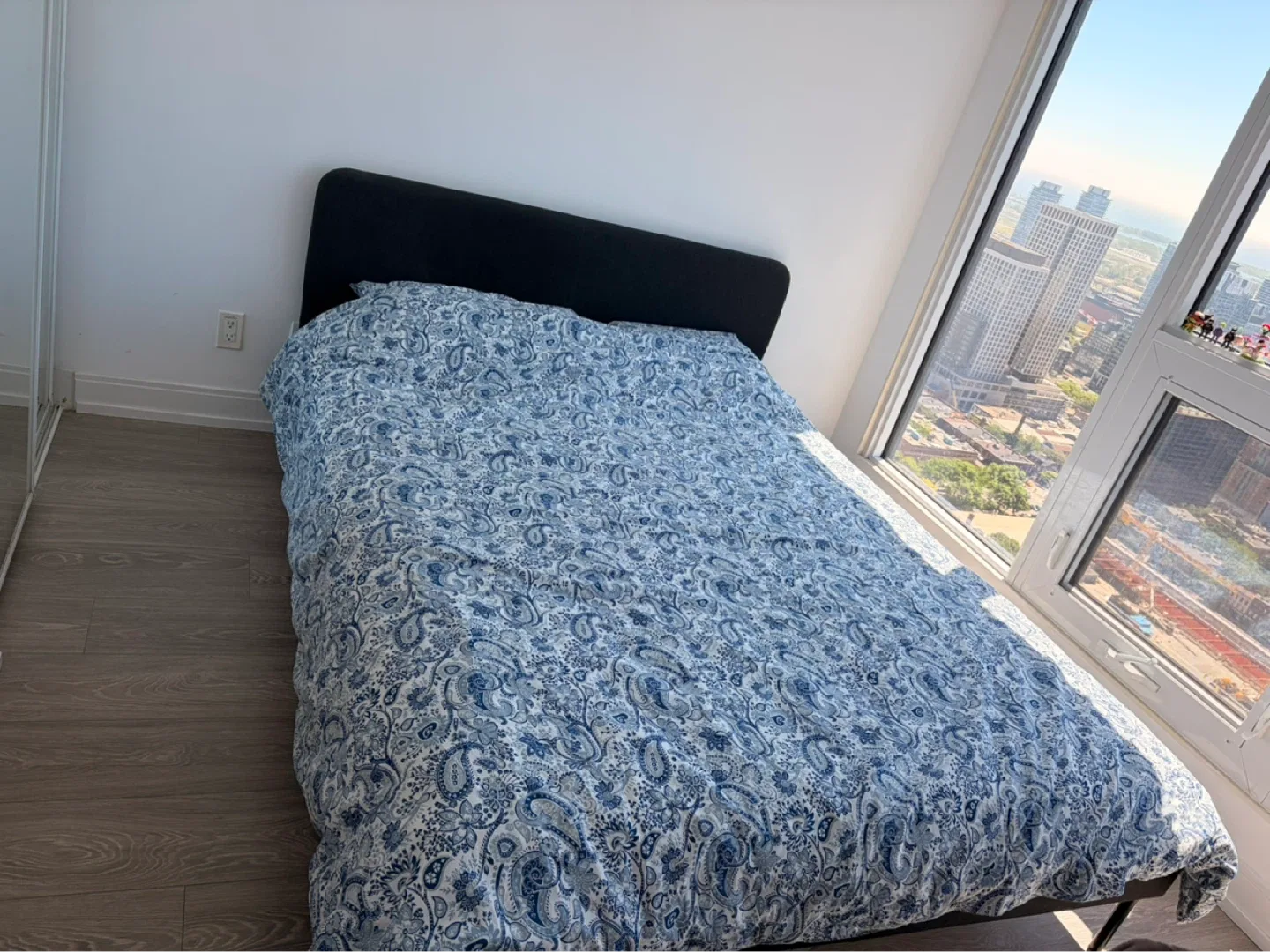 Black fabric bed frame with blue paisley duvet cover - photo 4