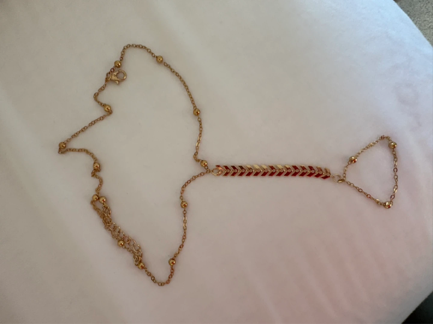 Gold Tone Chain Hand Bracelet with Red and Gold Accent