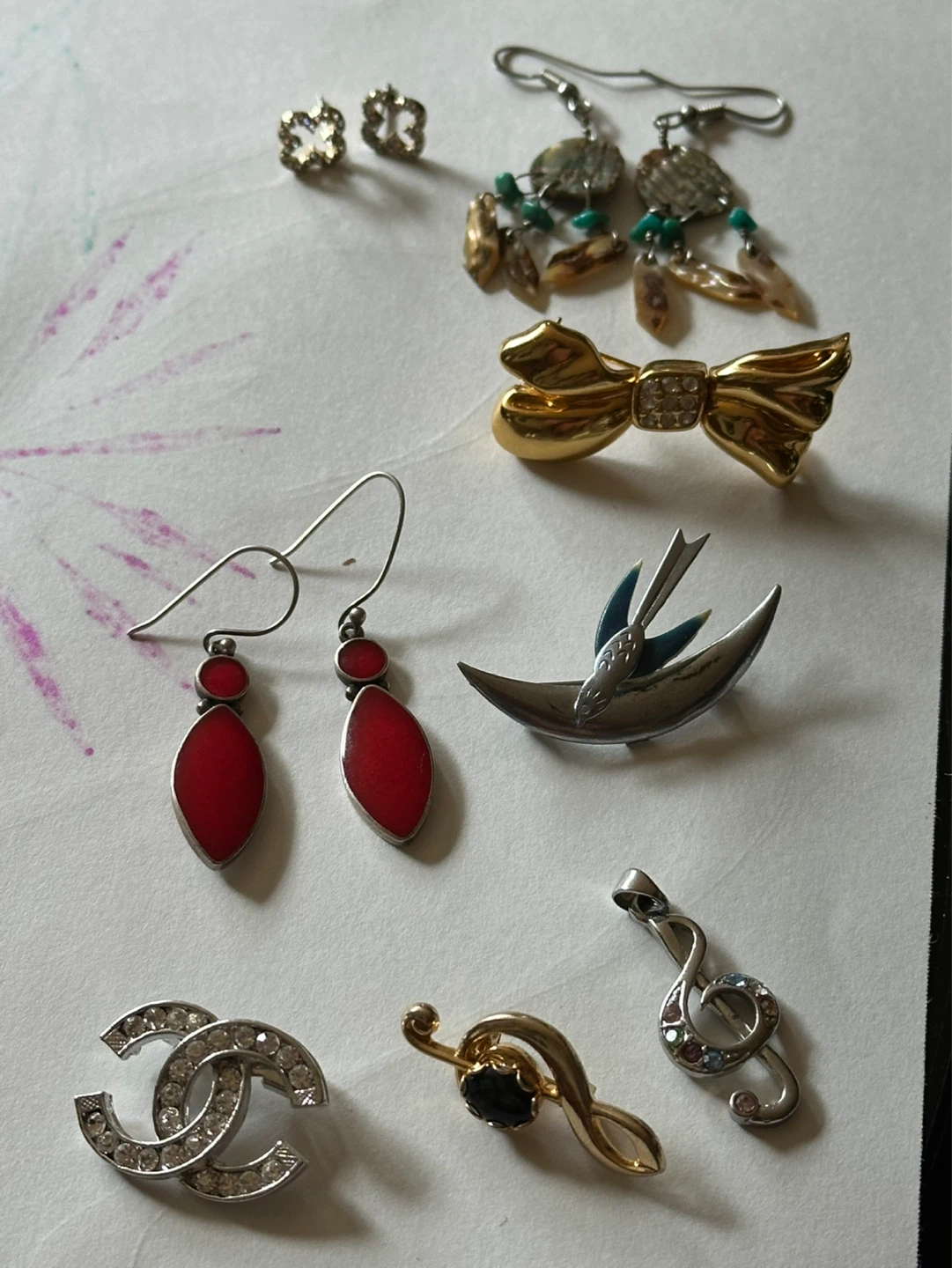 Earrings and brooches