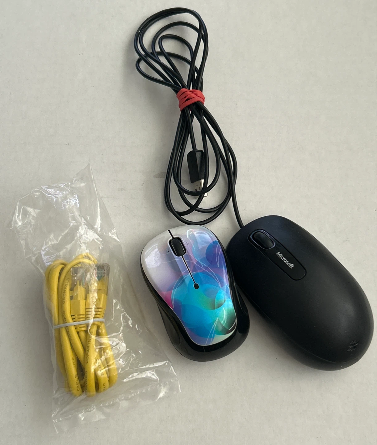 Logitech & Microsoft Computer Mice with Yellow Ethernet Cable