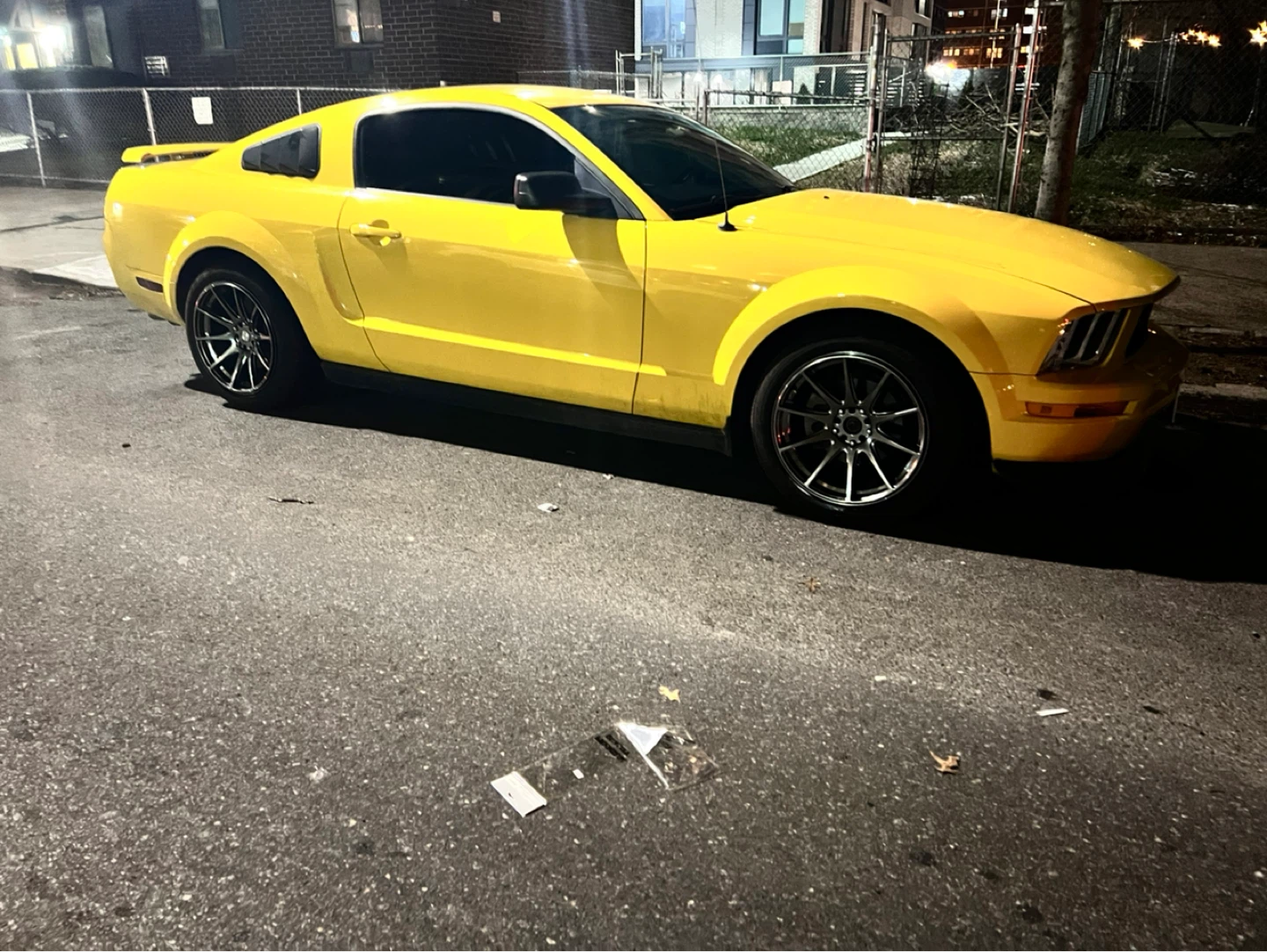 Yellow Ford Mustang Coupe 2005
